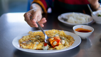Close up women eating seafood