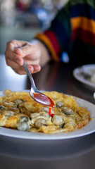 Close up women eating seafood