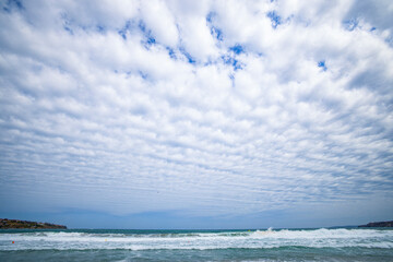 landscape with formation of clouds in the sky on a summer day.