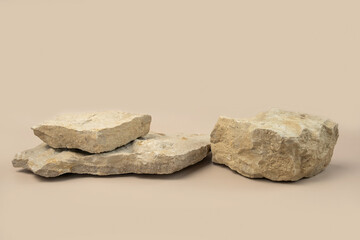 Stone podium for show cosmetics product presentation. Abstract minimal backdrop. Three rock form....