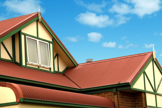 Red Colorbond Roof Underneath the Billowing Blue Sky