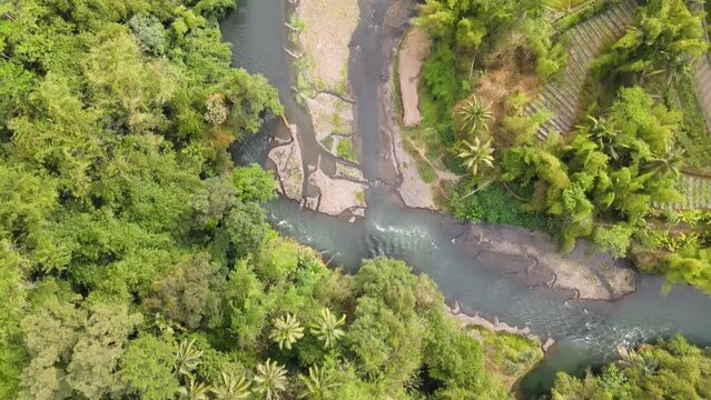 Aerial footage over the Elo River and the jungle in Central Java, Indonesia.