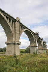 View of the abandoned old Mokrinsky railway bridge. Russia, the village of Mokry, the bridge was built in 1918