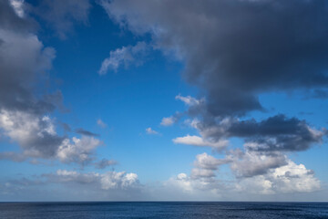 Naklejka na ściany i meble The picturesque Caribbean sky over the sea
