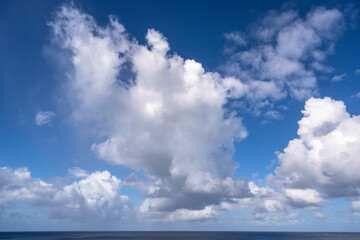 Naklejka na ściany i meble The picturesque Caribbean sky over the sea