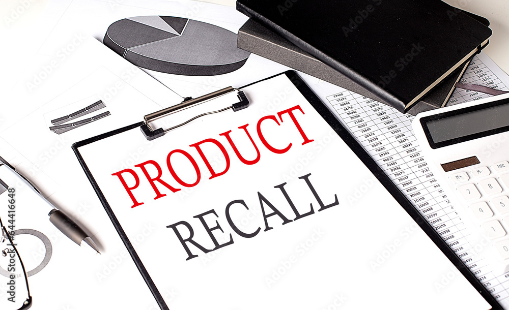 Poster product recall text on paper clipboard with chart and notebook on withe background