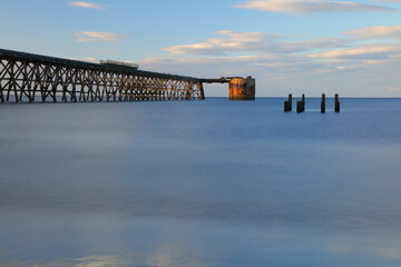 Long exposure image of a old derelict industrial pier at Hartlepool, England, UK.