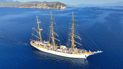 Aerial drone photo of classic wooden sail boat cruising in deep blue Mediterranean calm sea - obrazy, fototapety, plakaty