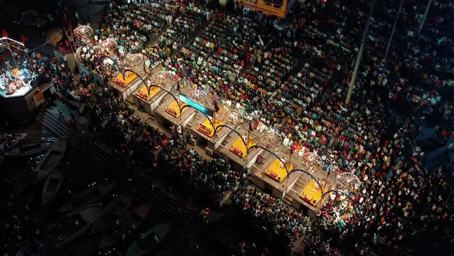 Aerial view of religious and spiritual ceremony that is performed every evening along the Ghats of the Ganges River in Varanasi, Uttar Pradesh, India.