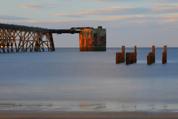 Long exposure image of a old derelict industrial pier at Hartlepool, England, UK.