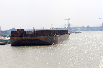 Fototapeta premium Coal Mining in Musi River, Palembang, Indonesia.