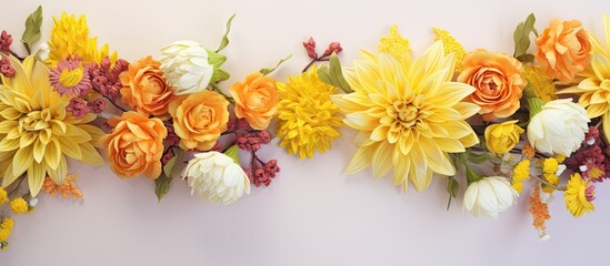 Fototapeta na wymiar Yellow flowers arranged in a bouquet with a mix of chrysanthemum dahlia and orchid in vibrant colors of yellow orange and green set against a isolated pastel background Copy space