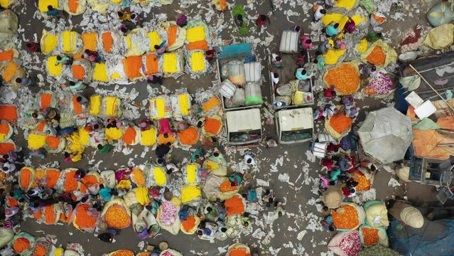 Kolkata, India - 13 May 2023: Aerial view of Mallick Ghat flower market under Howrah Bridge on the banks of the Hooghly river in Kolkata, West Bengal, India.