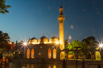 Sanliurfa, Turkey - June 19, 2023 : Balıklıgöl (Balık Lake) and Rizvaniye Mosque Landscape in...