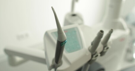 Tools and equipment for dental treatment in a dental clinic. Close-up of the dentist's workplace.