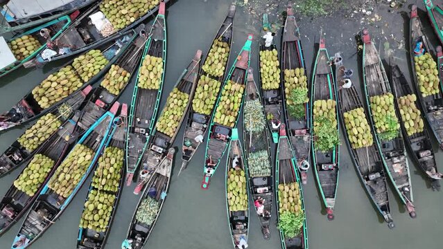 Aerial view of floating market of seasonal fruits on the boats in Kaptai Lake, Rangamati, Bangladesh.