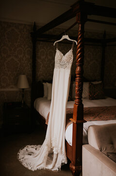 wedding dress on the bed