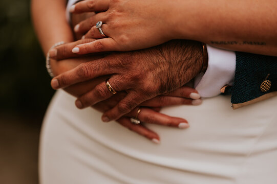 hands of the groom and bride
