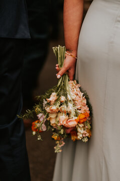bridesmaid holding bouquet