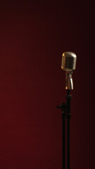 microphone on a red wall