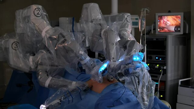 Modern surgical system. A medical robot performs surgery in the operating room. Minimally invasive robotic surgery.