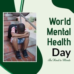Composite of world mental health day text over sad african american boy