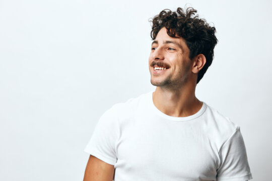 Man t-shirt smile portrait emotion studio white lifestyle isolated face success background fashion hipster