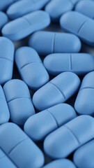 Blue pills close up, rotation. Pharmaceutical Industry