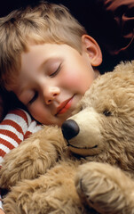 A little child sleep hugged at fluffy soft toy