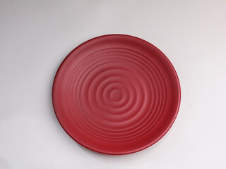 Empty plate, clear and clean, isolated on white background