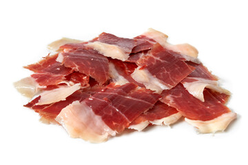 Sliced Iberian Serrano ham isolated on white background. Iberian serrano ham is a Spanish delicacy,famous for its smoky flavor and tender, salty texture, the richness of the Iberian culinary tradition