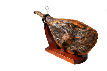 A leg of Iberian serrano ham isolated on white background. Iberian serrano ham is a Spanish delicacy, famous for its smoky flavor and tender, salty texture, the richness of the Iberian culinary 