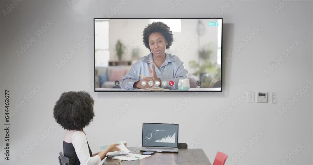 Poster African american businesswoman on video call with african american female colleague on screen