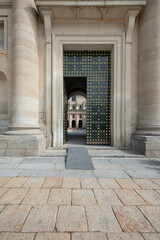 A side door on the main façade of the Escorial monastery in Madrid
