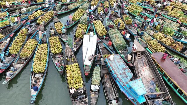 Aerial view of floating market of seasonal fruits on the boats in Kaptai Lake, Rangamati, Bangladesh.