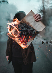 The burning book in the smoke