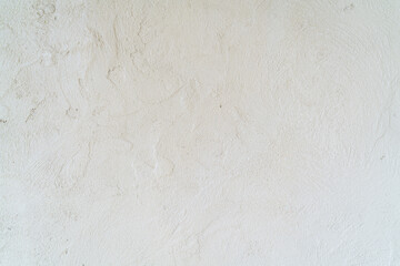 A picture of a bare plaster wall that is plastered with plain white plaster is part of the wall of the house, which is a popular color on the wall of the house or building wall. and commonly used as a