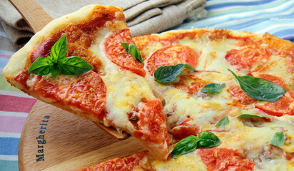 homemade traditional pizza with mozzarella cheese and tomatoes