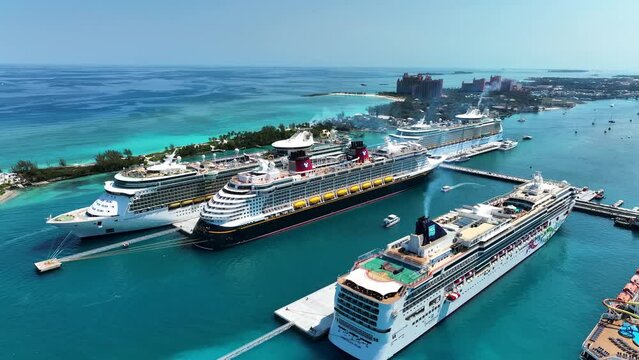 Bahamas - 01 August 2023: Aerial view of cruise ships docked at the port of Nassau on Paradise island along the barrier reef, Bahamas.