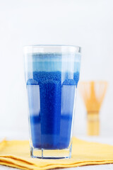 Blue matcha latte drink made from clitoria flowers with coconut milk. Healthy drink, lactose, gluten and sugar free.