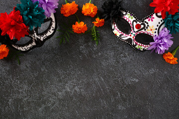 Skull masks for Day of the dead, Dia De Los Muertos Mexico's holiday on stone table.