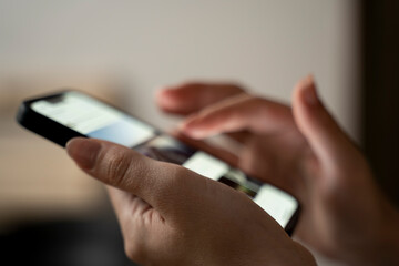 Hand holding smartphone, demonstrating digital communication and wireless technology