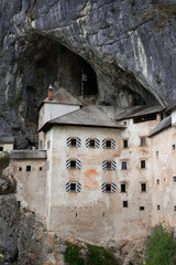 13 century Predjama castle built half inside the cave on a territory of modern Slovenia