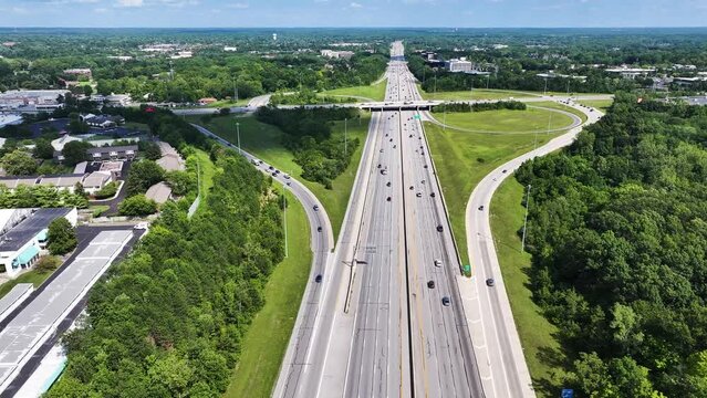 Aerial view of vehicles driving on the interstate near Columbus town, Ohio, United States.