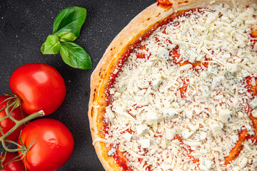 raw pizza four cheeses assorted akmezan cheese, gorgonzola, mozzarella, emmental fast food appetizer meal food snack on the table copy space food background rustic top view