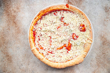 raw pizza four cheeses assorted akmezan cheese, gorgonzola, mozzarella, emmental fast food appetizer meal food snack on the table copy space food background rustic top view