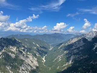 Fototapeta na wymiar view of green valley down Slovenian alps on the way to Mala Mojstrovka