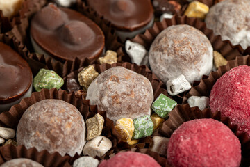 Truffle chocolate. Various chocolate pralines in bulk. close up