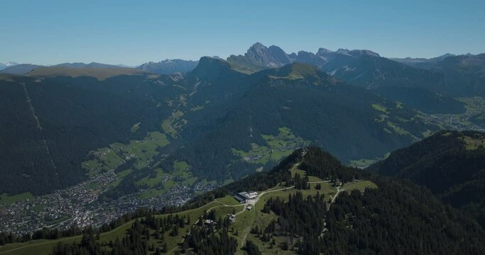 Aerial view of the mountain ridge at the top of Alpe di Siusi (Seiser Alm) on the Dolomites mountains, Trentino, South Tyrol in Northern Italy.