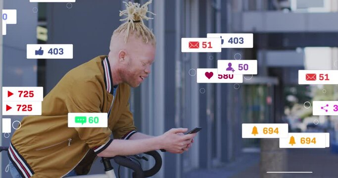 Animation of social media icons over happy albino man with bicycle using smartphone on the street
